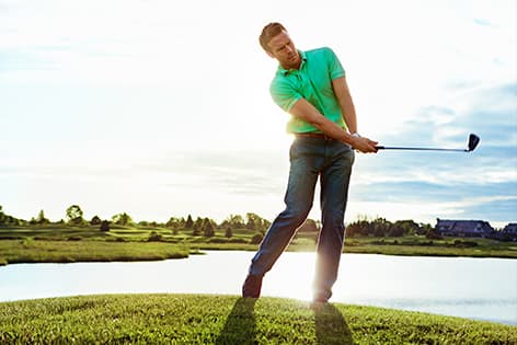 a golfer mid-swing
