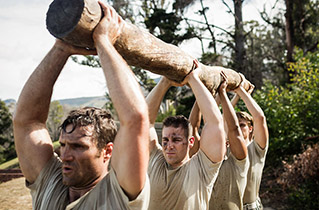 marines doing a log carry